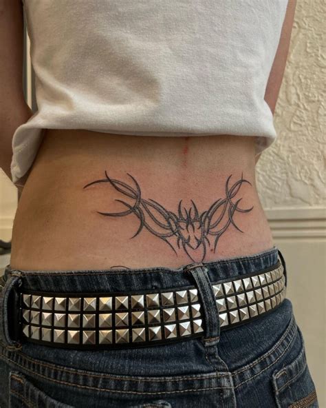 12 Captivating Cyber Sigilism Lower Back Tattoo Styles