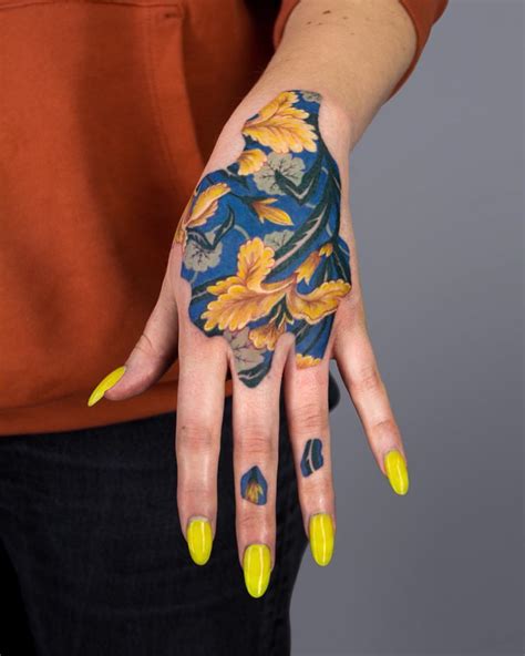 32 Brilliant Hand Tattoos For Women In 2024