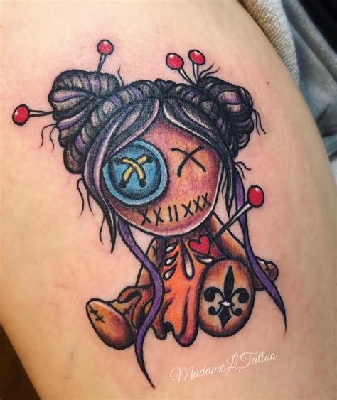 33 Voodoo Tattoo Designs Inkdoneright Voodoo Doll Tattoo Voodoo