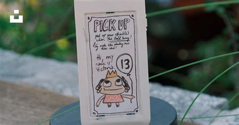 A Food Pick Up Order Number Is Displayed Photo Free Human Image On