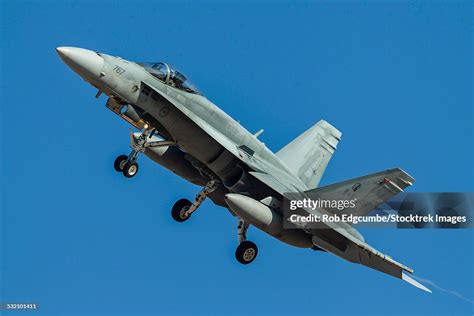 A Royal Canadian Air Force Cf188 Hornet Turns On To Final Approach At