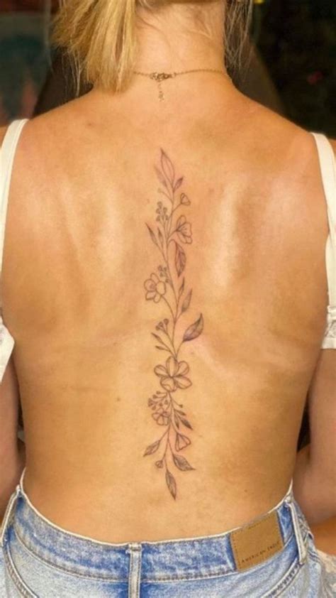 A Simple Floral Vine Spine Tattoo That Exudes Beauty Amp Elegance