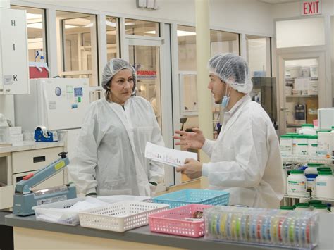 Drive Acoustic Cell Migration With Microfluidic Cues