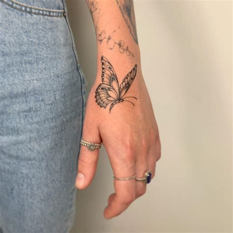 Butterfly Hand Tattoo 8 Stunning Designs With Meanings