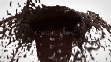 Chocolate Fountain Flowing Rich Dark Brown Liquid In Dynamic Cascades