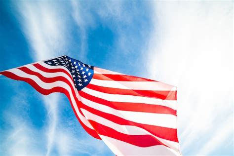 Close Up United States Of America Flag On The Blue Sky Background Usa