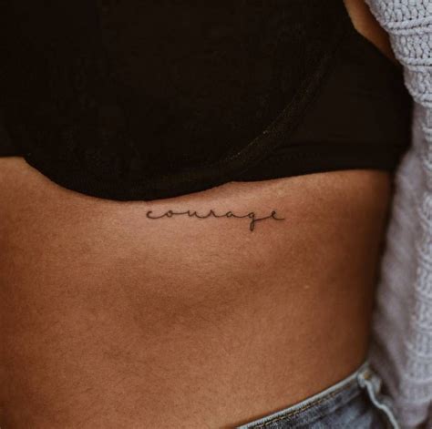 Courage Lettering Tattoo Under The Breast