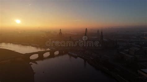 Drone View Of Silhouetted Skyline Of Dresden City With River And Bridge Drone View Of Silhouetted Skyline Of Dresden City With River And Bridge