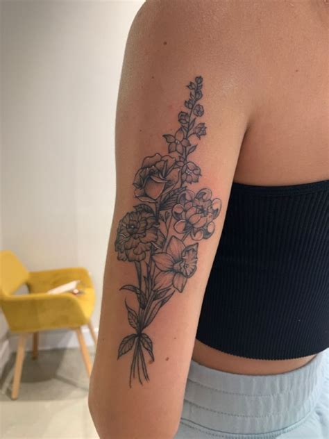 Flower Bouquet Tattoo On Back Of Arm At Danica Luke Blog