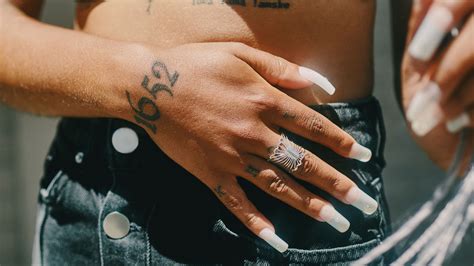 How To Heal Finger And Hand Tattoos With These Aftercare Tips From Artists Allure