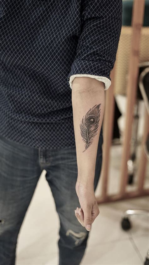 Ink Feather Tattoos 57 Attractive Wrist Feather Tattoos