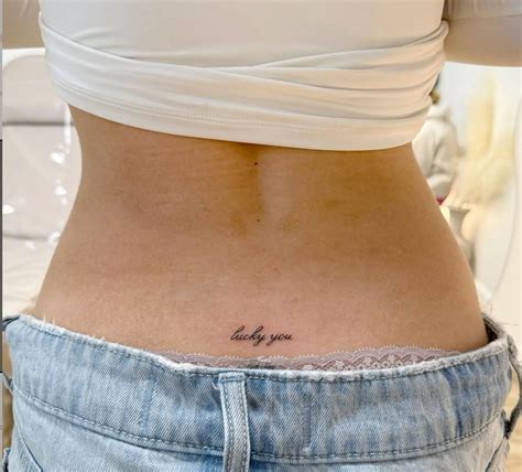 Lower Back Tattoo In 2025 Tattoo Fonts Back Tattoo Discreet Tattoos