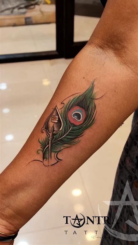 Murugar Vel Tattoo With Peacock Feather Tattoo Peacock Feather Tattoo