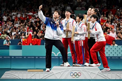 North South Korea Olympic Podium Selfie Goes Viral The Japan Times