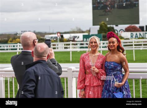 Racegoers Place Bets During The The Randox Grand National 2024 Ladies