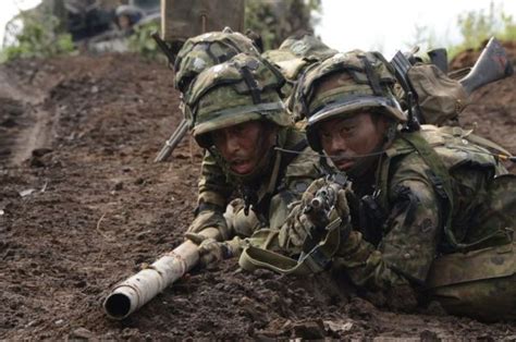 Ready Or Not Japan To Ease Rules On Foreign Intervention Time Com