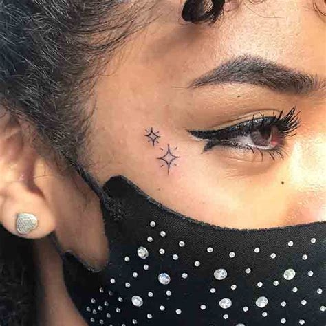 Simple Small Face Tattoos Female