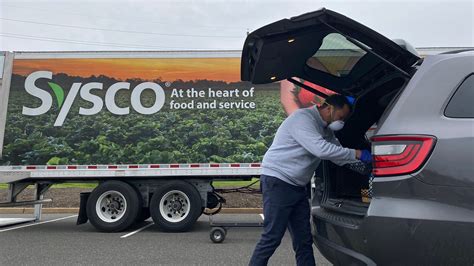 Somerset Patriots Sysco Team On Charity Pop Up Shop