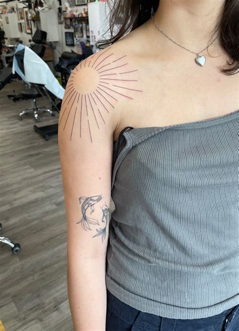 Sun Shoulder Tattoo