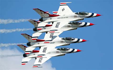 The United States Air Force Thunderbirds Fly In A Trail Formation The United States Air Force Thunderbirds Fly In A Trail Formation