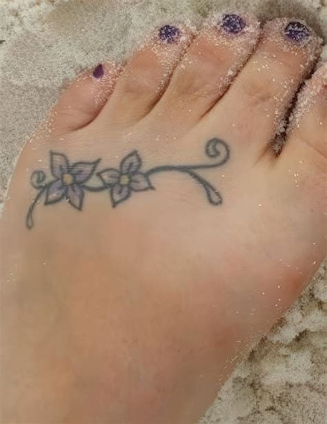Tiny Foot Tattoo