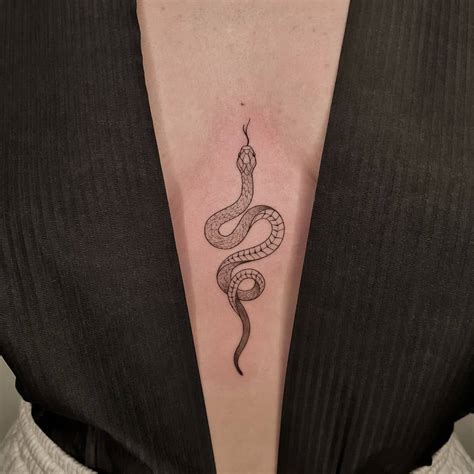 Top 10 Snake Sternum Tattoo Ideas And Inspiration