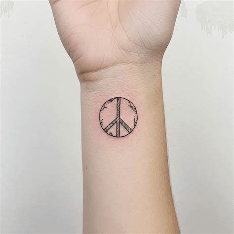 Top 12 Peace Sign Tattoo Designs You Ll Love