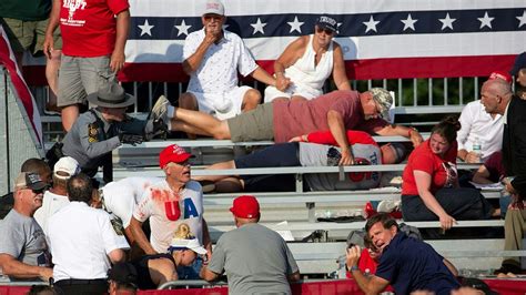 Trump Supporters At Pennsylvania Rally Take Cover From Gunfire That