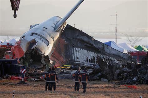 U S And Boeing Investigators Examine The Site Of Fatal South Korean Plane Crash Pbs News