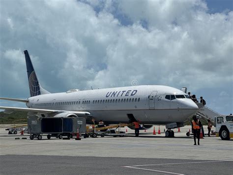 United Airlines Airplane At Providenciales Airport In The Turks And