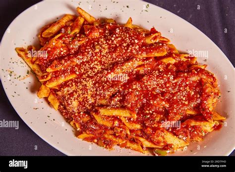 White Plate Of Fontanini Sausage Lunch Special Meal Italian Red Pasta