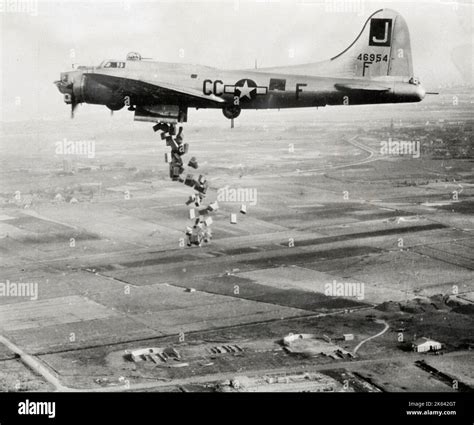 World War Ii Vintage Photograph B 17 Flying Fortress Makes Food Drop World War Ii Vintage Photograph B 17 Flying Fortress Makes Food Drop